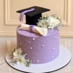 Purple Theme Graduation Cake by O’Clock in Lahore