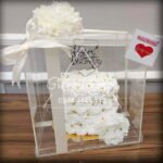 cake in acrylic box