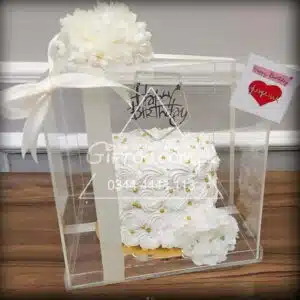 cake in acrylic box