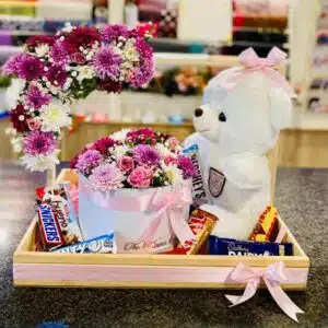 wodden basket with teddy